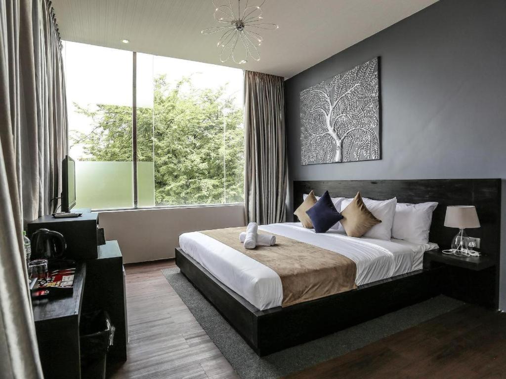 เดอ อาร์ท โฮเต็ล Hotel พนมเปญ ภายนอก รูปภาพ