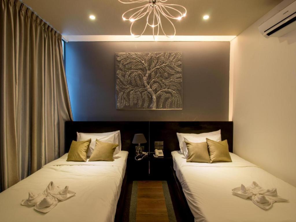 เดอ อาร์ท โฮเต็ล Hotel พนมเปญ ภายนอก รูปภาพ